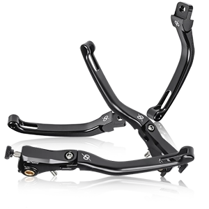 Tres juegos de palancas negras para motocicleta con función abatible y regulable, fabricadas en aluminio fresado CNC.